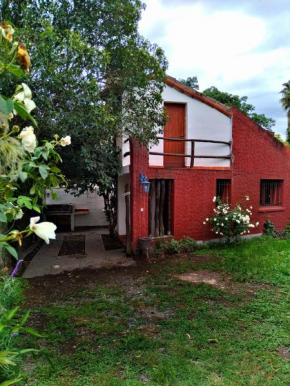 loft de 2 pisos con jardin, fogon, cochera y asador
